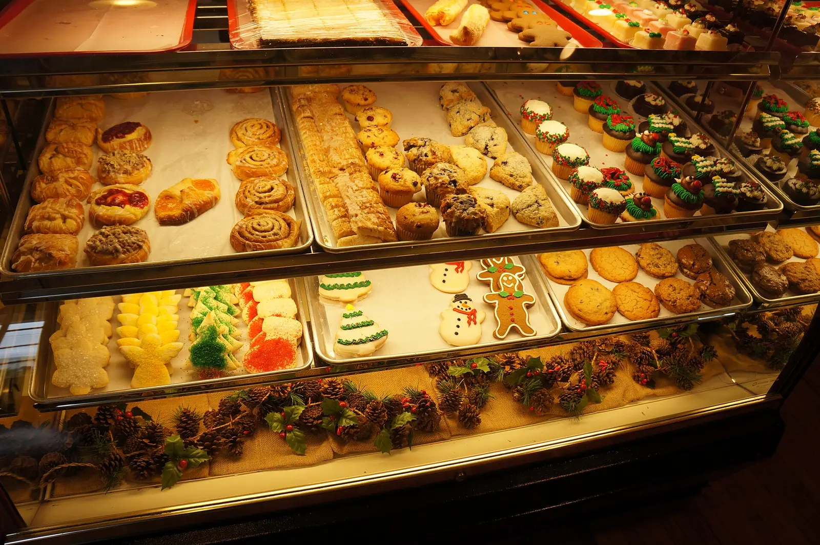 Pastries, muffins, cupcakes and decorated cookies in a bakery case in Greenville, S.C. The photo was not taken in Mount Pleasant.