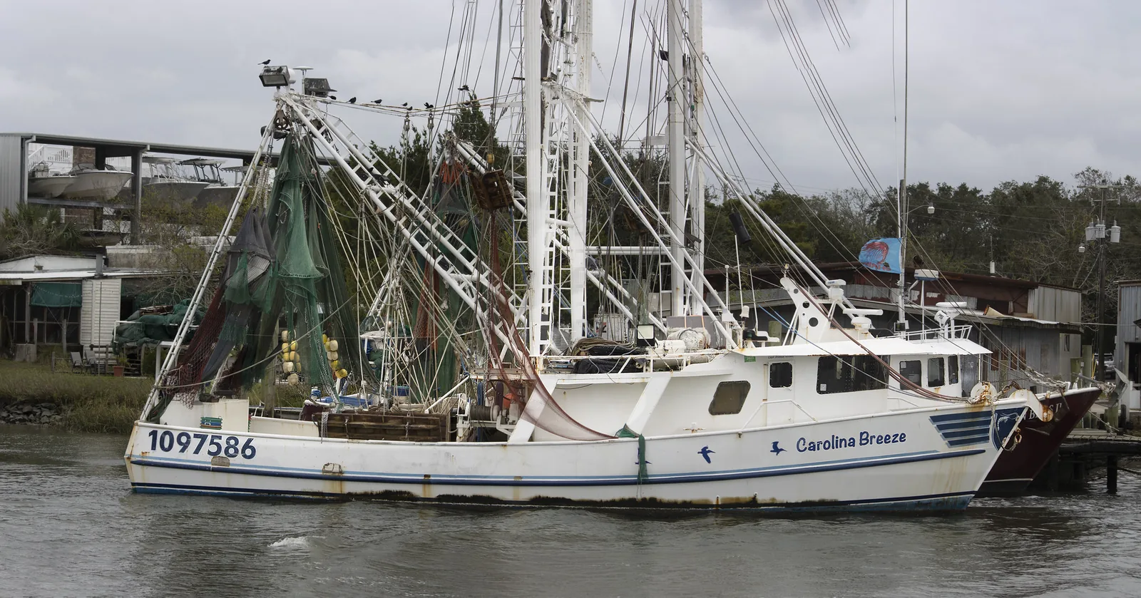 Captain Donnie Brown's working shrimp boat Carolina Breeze tied up on Shem Creek in Mount Pleasant.