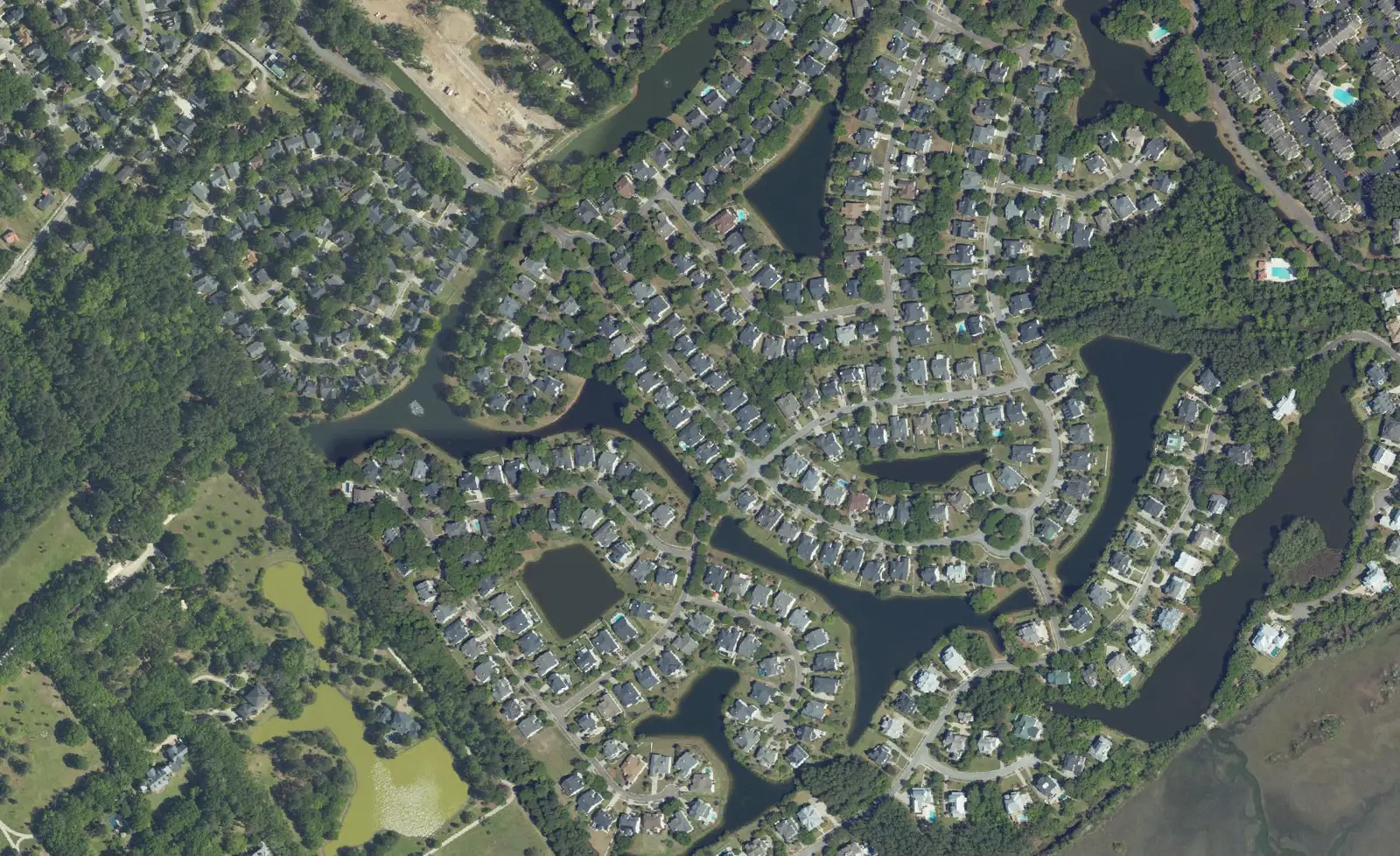 Aerial view of homes along the lakes and marsh creeks of Seaside Farms in Mount Pleasant.
