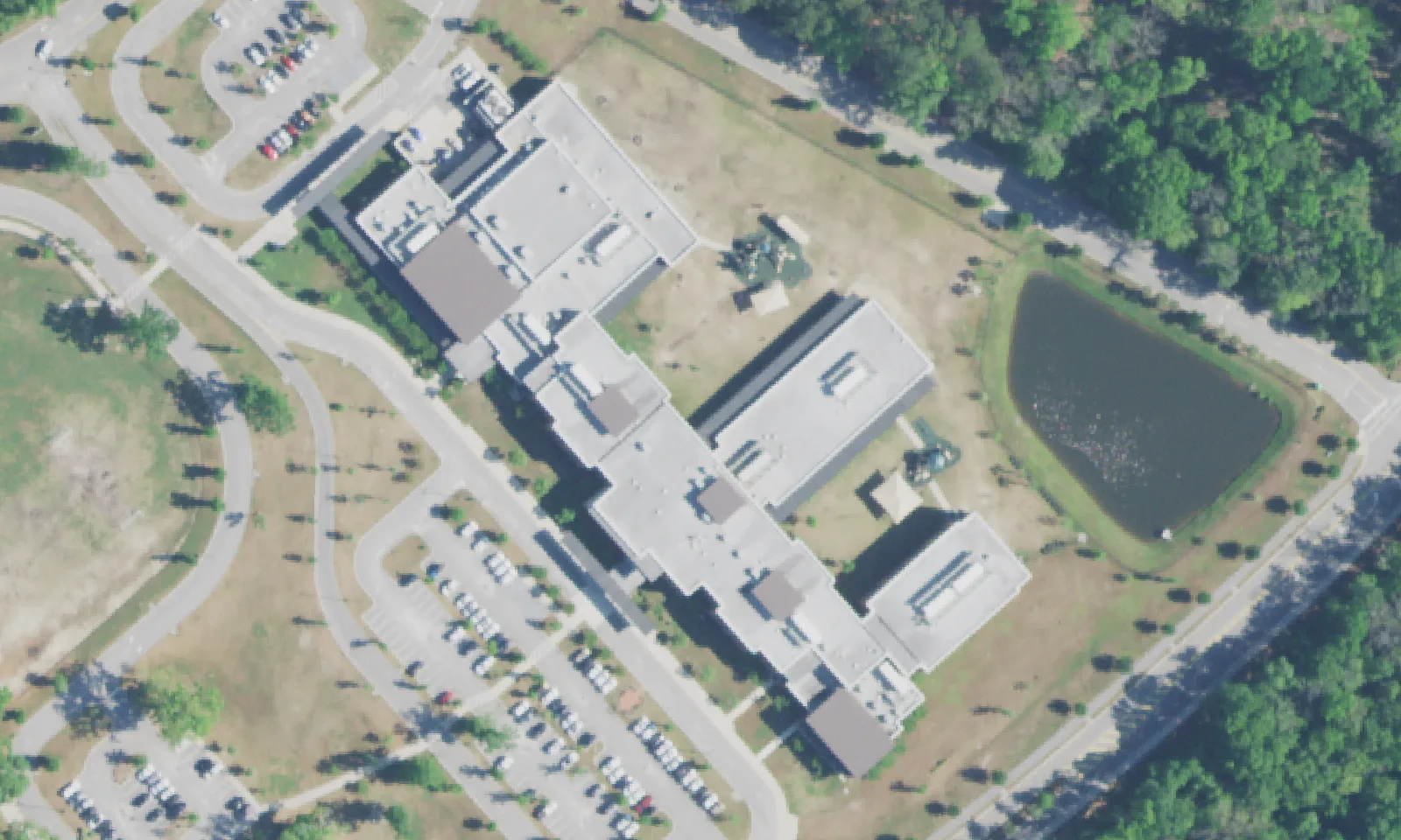 Jennie Moore Elementary School's building on Bulrush Basket Lane in Mount Pleasant, seen from the air