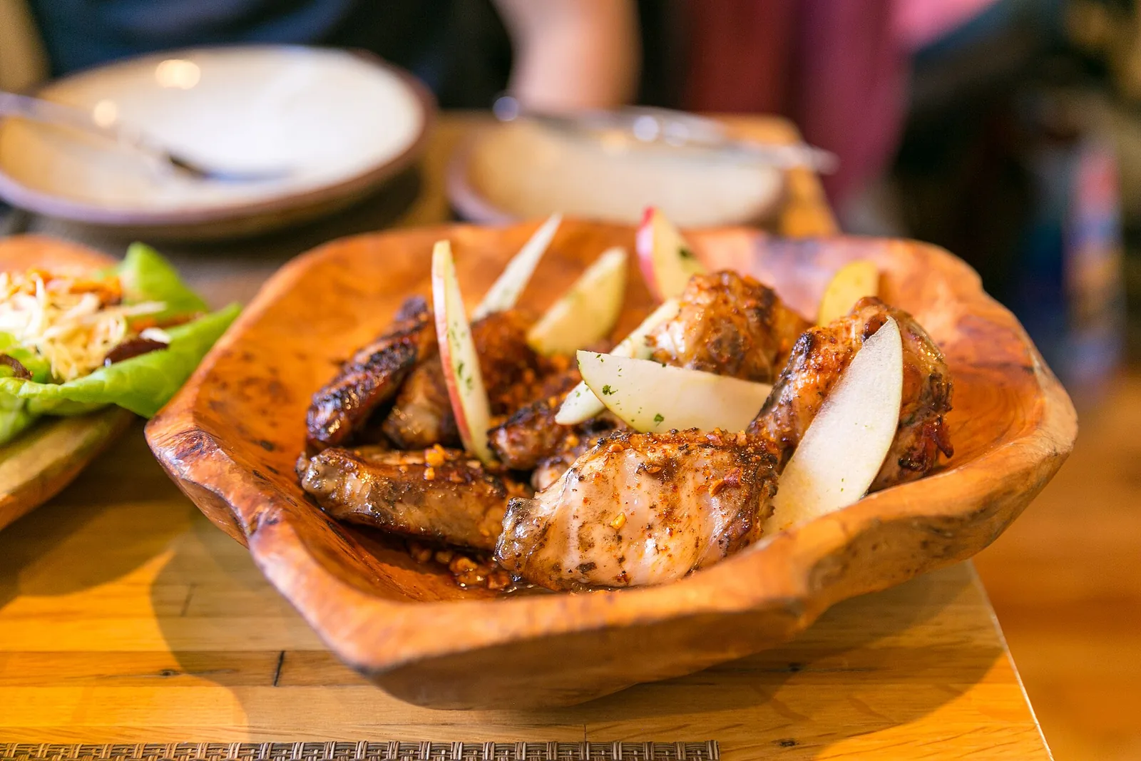 A plate of glazed chicken wings. The photo was not taken at a Mount Pleasant restaurant.